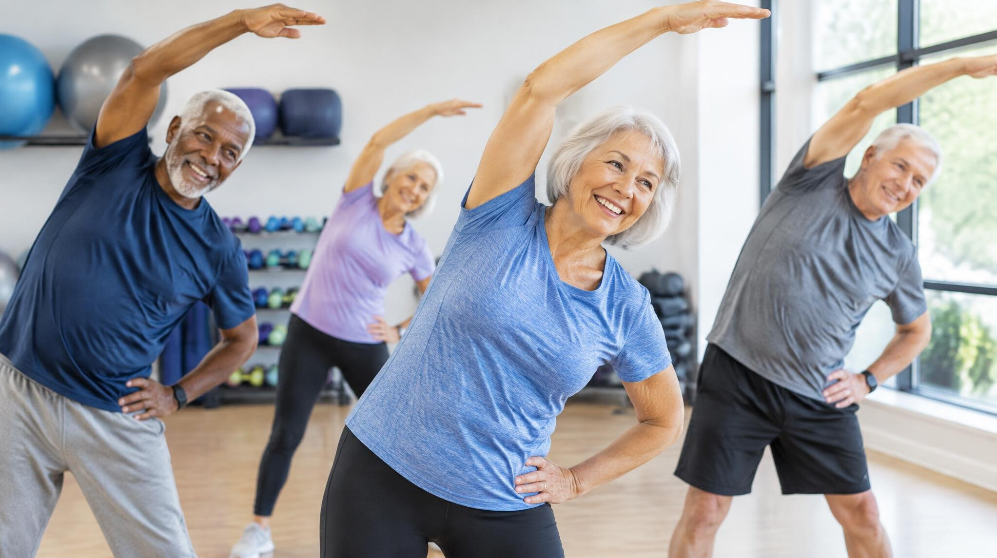 senior group exercising together