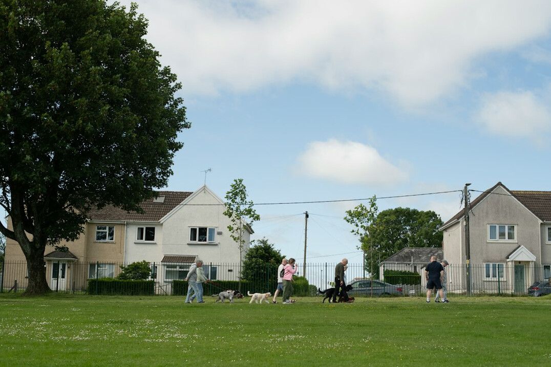senior couple walking in park