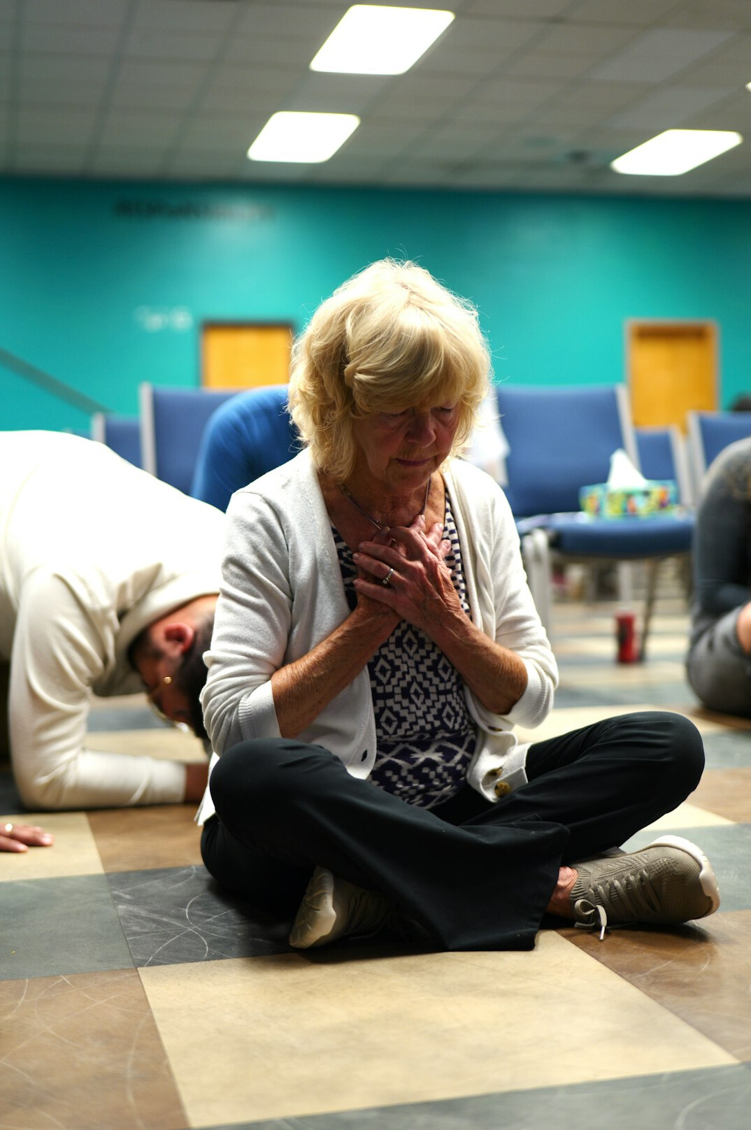 senior group doing yoga