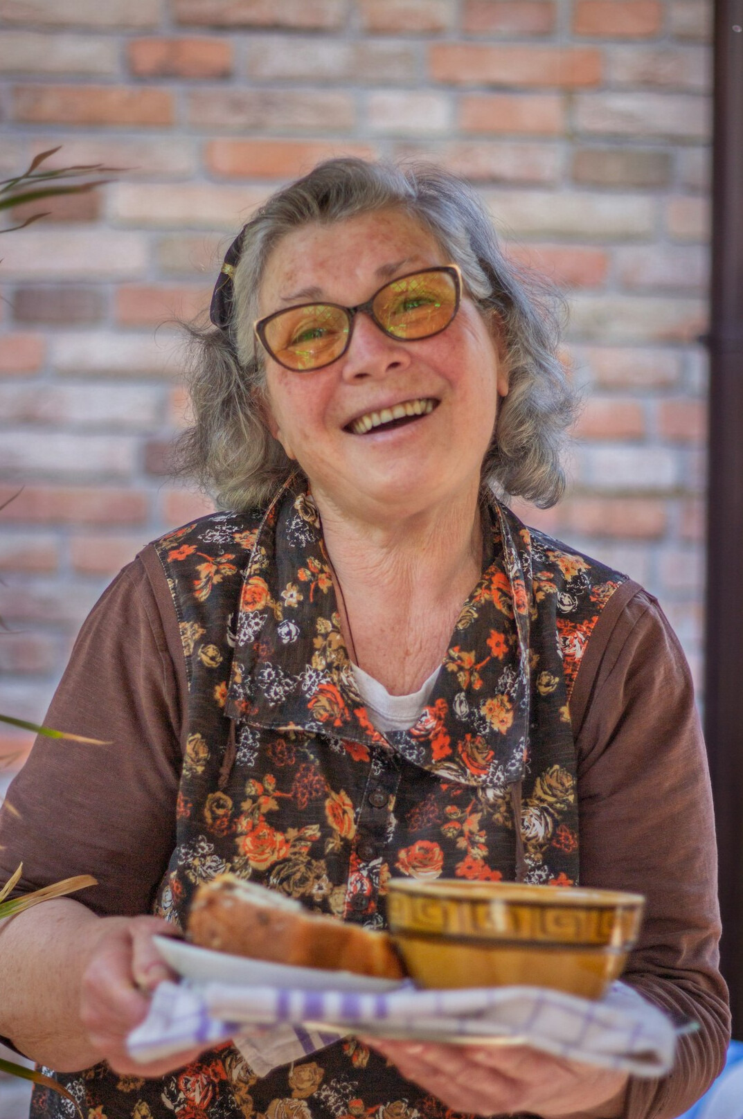 Portrait of a smiling senior woman with glasses